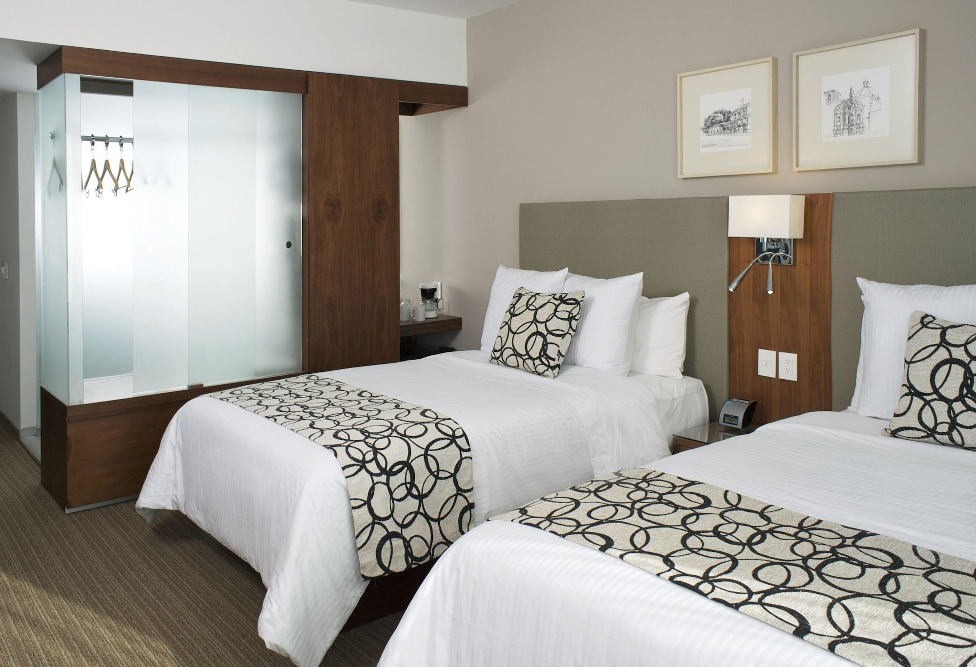 Casa Inn Premium Hotel Querétaro Exterior foto A typical room at the Westin